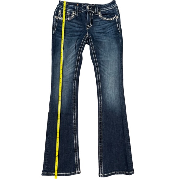 Miss Me Size 27 dark wash jeans signature boot, button flap pockets with designs - Picture 9 of 13